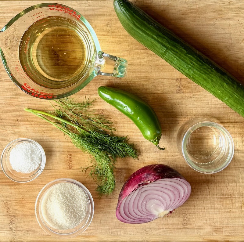 Ingredients displayed for spicy pickled cucumbers 