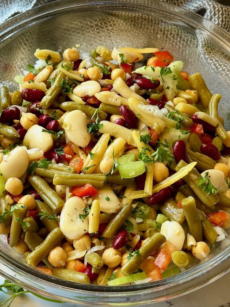 five bean marinated salad in a serving bowl