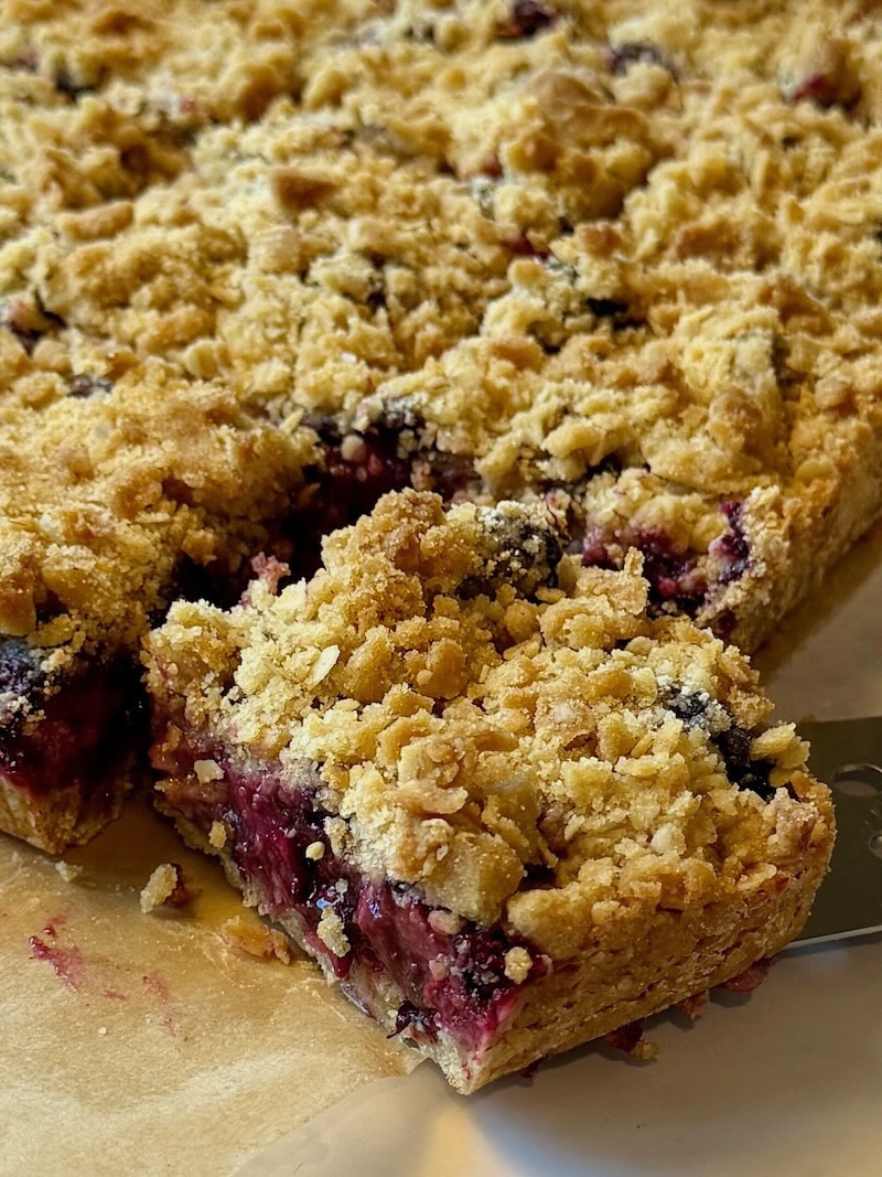 blackberry zucchini bars sliced in squares