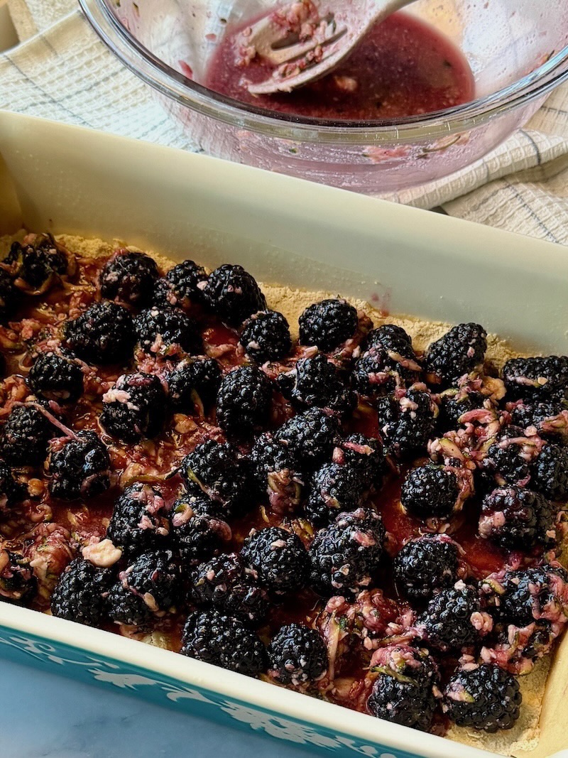 berries and zucchini mixture on top of the crust.