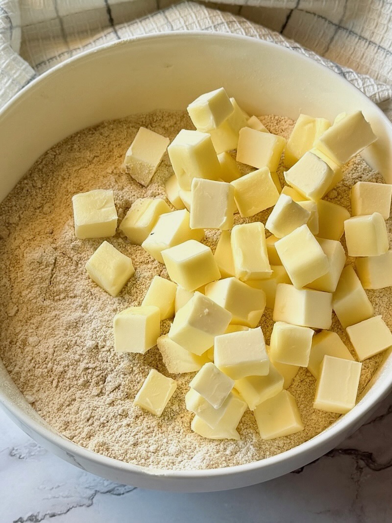 Cold butter cubes added to the dry ingredients.
