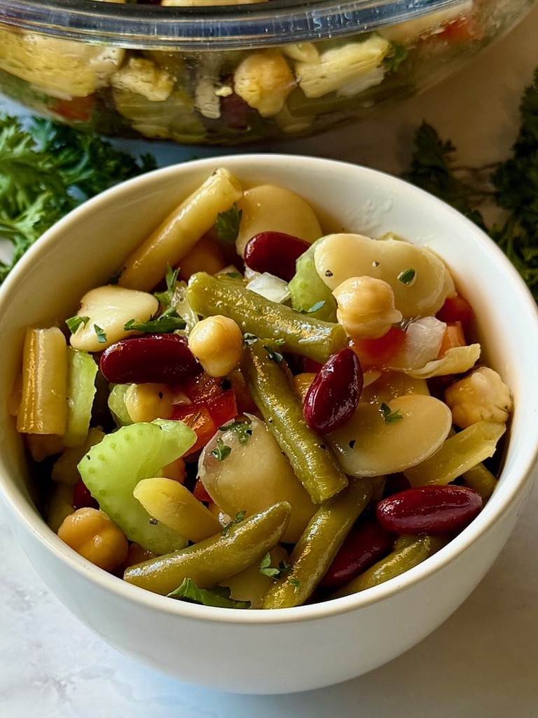 marinated bean salad in a serving bowl