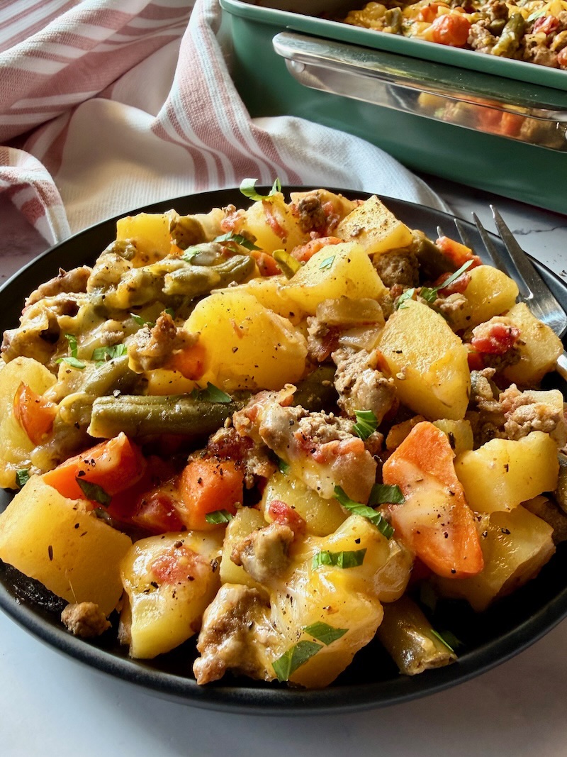 Ground beef casserole plated on a serving plate. 
