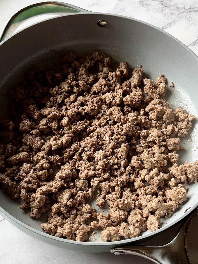 ground beef cooked in a skillet