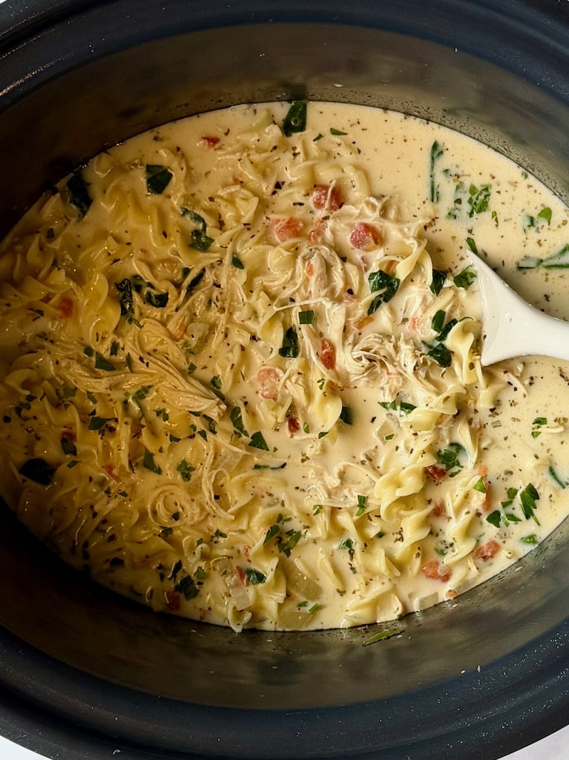 creamy chicken lasagna soup prepared in the slow cooker