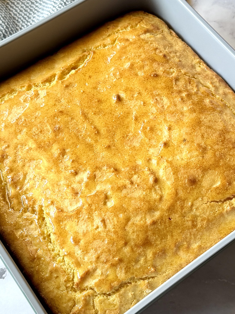 Baked cornbread with honey over the top
